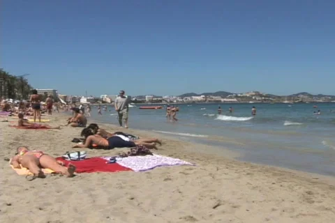 Beach, People on beach, walking on beach, Spanish beach, Travel, tropical Video stock 343853