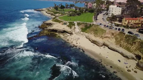 Beach with people at La Jolla CA descending Stock Footage 160810940