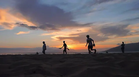 Beach People at Sunset Stock Footage 23856356