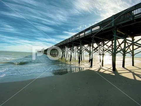 Beach pier Stock Photos
