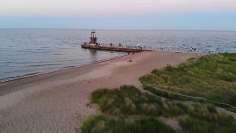 Beach Pier at Sunset Drone Shot Stock Footage 129762850
