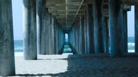 Beach Pier with waves and sand at Huntington Beach, California Video stock 53821428