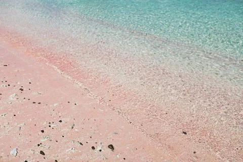 Beach with pink sand and turquoise water Stock Photos