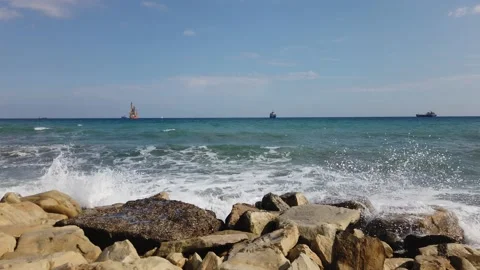 Beach of pleasure - rocks and waves Stockbeeldmateriaal 148109793