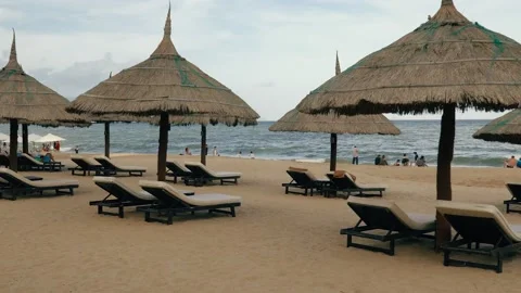 Beach. Point of view of a tourist walking along the uncrowded beach. Video stock 136949110