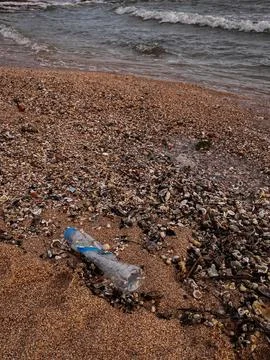 Beach polluted with plastic waste.environmental problems of humanity Stock Photos