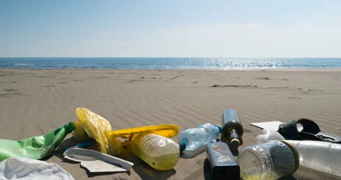 Beach pollution by garbage, stop motion animation Stock Footage 126786554