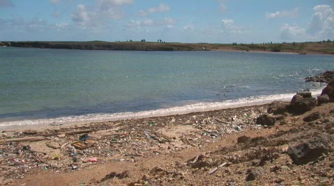 Beach with pollution - pan left Stock Footage 90665