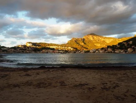 At the Beach of the Port de Pollença in Mallorca in Spain with amazing sunlight Stock Photos