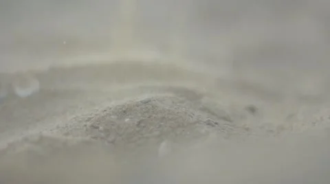 On the beach pours sand Stock Footage 64706186
