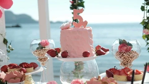 On the beach prepared meals for celebrating the 5th anniversary Stock Footage 74693012