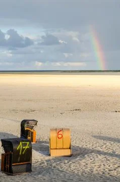 Beach with rainbow Stock Photos