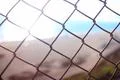 Beach Resort Sunlight and wire fence in Malibu California USA Photo