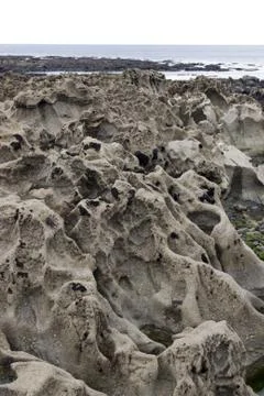 Beach rock formation Stock Photos