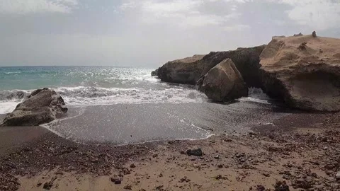 Beach with rocks and sand Stock Footage 332794435