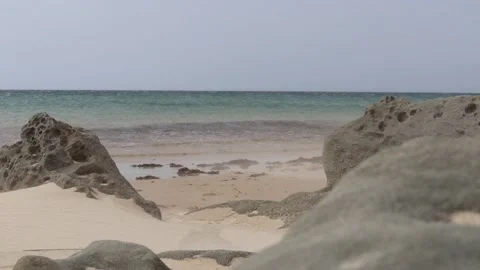 Beach with Rocks and Waves Rolling Stock Footage 147981016