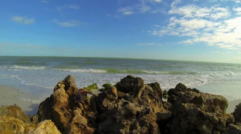 BEACH, ROCKS IN FOREGROUND, FACING OUT TO OCEAN Video stock 37154065