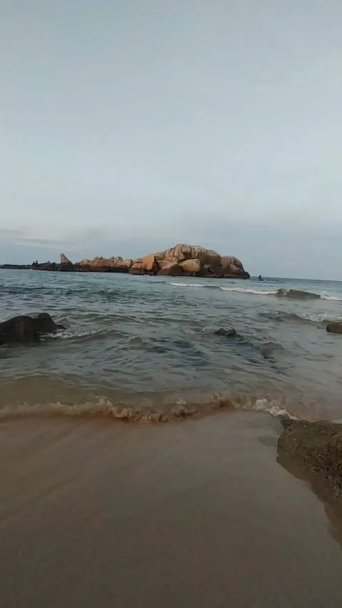 Beach Rocks Ocean Waves 4K Stock Footage 335939114