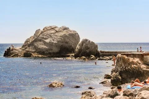 Beach on the rocks. Stock Photos