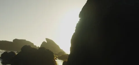 Beach Rocks Silhouetted at Sunset 스톡 동영상 85818835