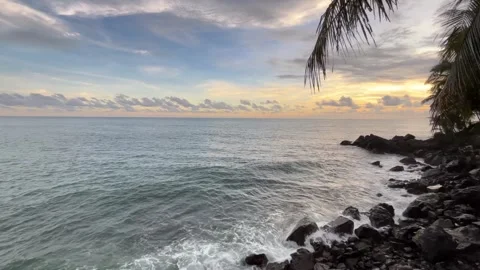 Beach with rocks under the cliff Stock Footage 245807719