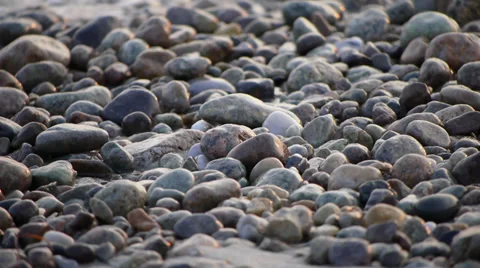 Beach rocks with water ripple Stock Footage 27237613