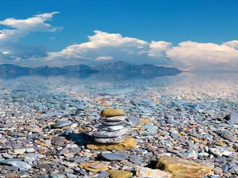 Beach of rough boulders Stock Photos