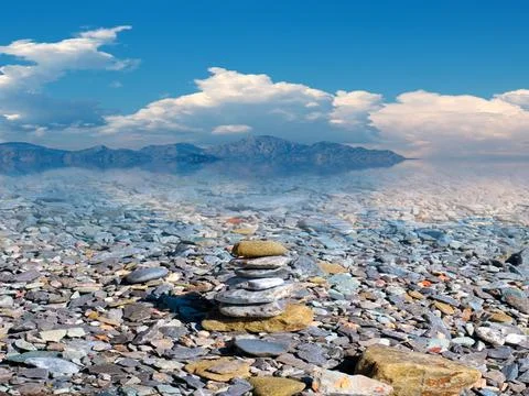 Beach of rough boulders Stock Photos