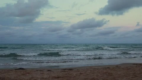 Beach sand close-up, white foamy nature, dramatic sky, exotic shore. Beach text Stock Footage 274048099
