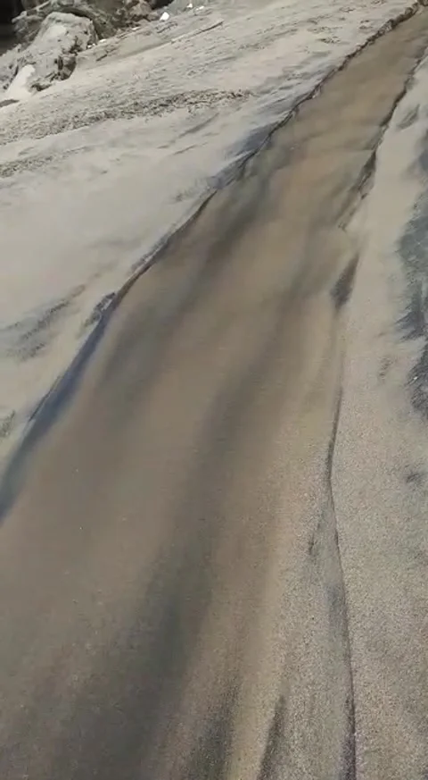Beach sand flows like water Stock Footage 219485593