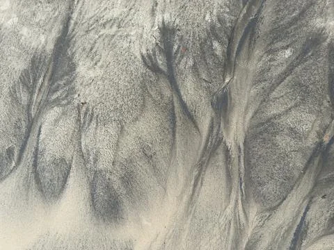 Beach sand texture with tiny grains Stock Photos