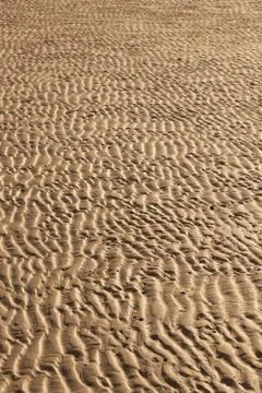 Beach sand texture wave pattern Stock Photos