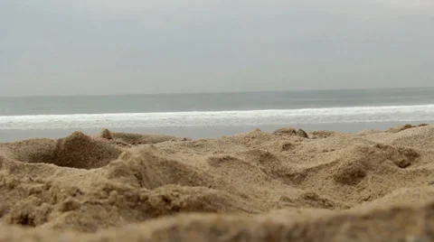 Beach Sand with Waves Crashing Vídeo Stock 34813888