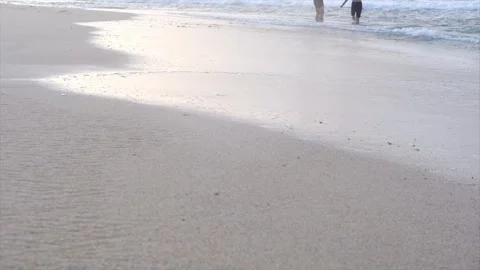 Beach Sand Waves  Feet Walking. Stock Footage 320441792