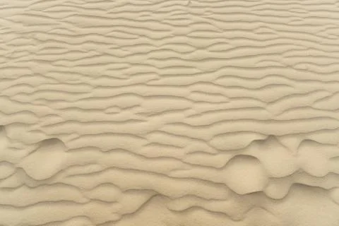 Beach sand waves Stock Photos