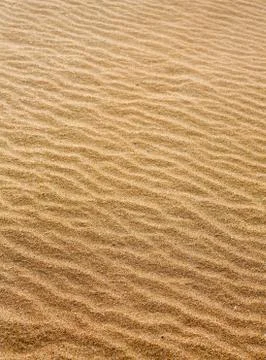 Beach sand waves warm texture pattern Foto stock