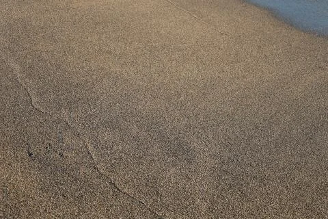 Beach sand writing Stock Photos