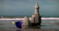 Beach Sandcastle Falls Down with Tide HD Footage