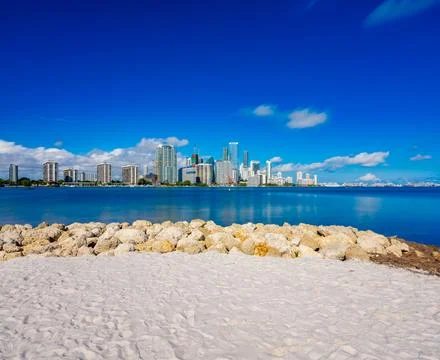 Beach sands at Key Biscayne with view of Brickell in the distance Stock Photos