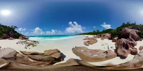 Beach with scattered rock formations. La Digue, Seychelles. Stock Footage 311038073