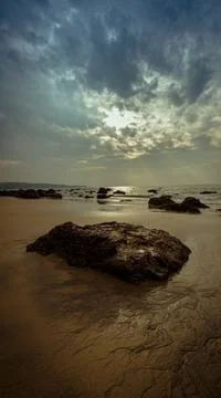 Beach scene in the evening Stock Photos