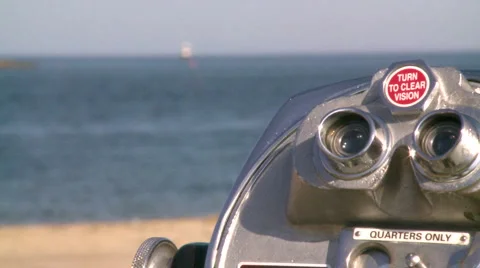 Beach scene with lighthouse and pay viewer (3 of 6) Stock Footage 4161583