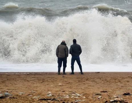 Beach scene with rough seas 스톡 사진