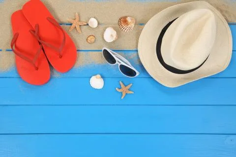 Beach scene in summer on vacation with shells, copyspace Stock Photos