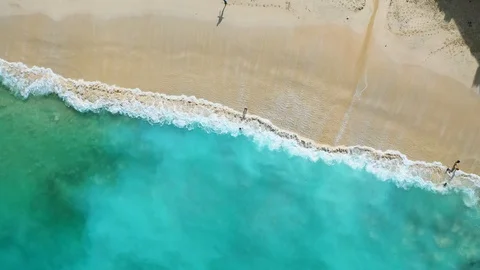 Beach scene - turquoise transparent ocean and white sand beach. Stock Footage 129504242