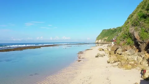 Beach scene - turquoise transparent ocean and white sand beach. Stock Footage 133821534