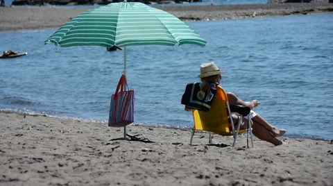 Beach Scene umbrella 02osv Stock Footage 46330560