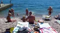 Beach on the sea with people. Editorial HD Footage