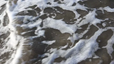 Beach sea sand with foam pattern. Stock Footage 138652731