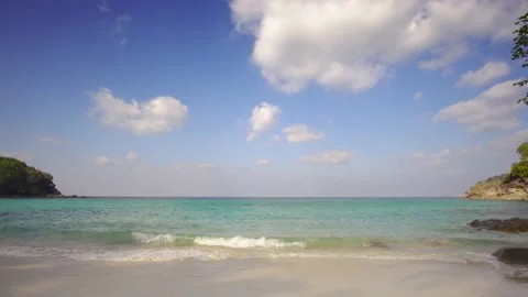 Beach sea sand sun cloud water wave blue sky background Freedom Phuket Thailand Stock Footage 153376203